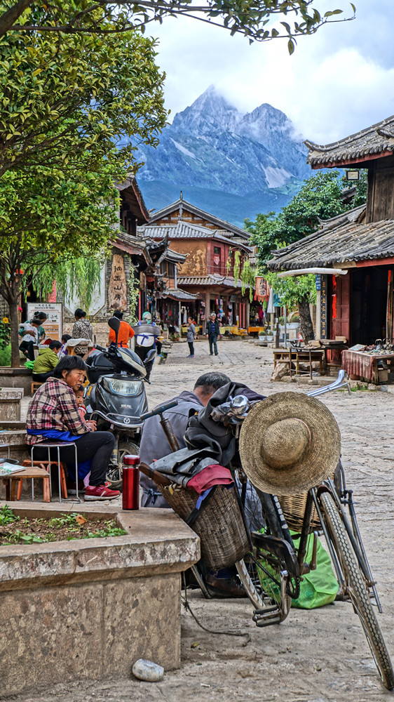 Baisha Old Town with Jade Dragon Snow Mountain in Lijiang by Gary Elliot