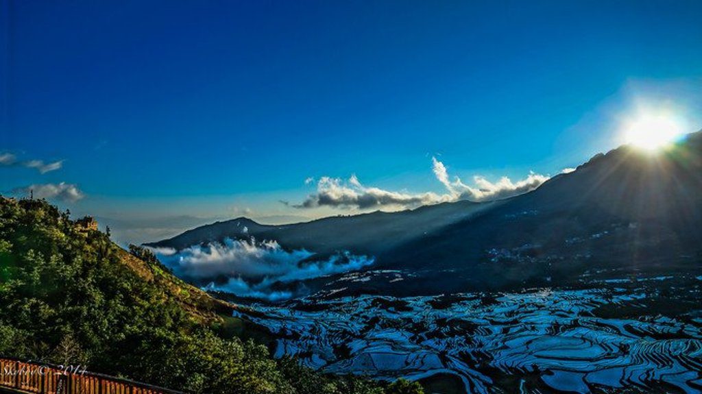 The Scenic View of Sunrise in Duoyishu Rice Terraces