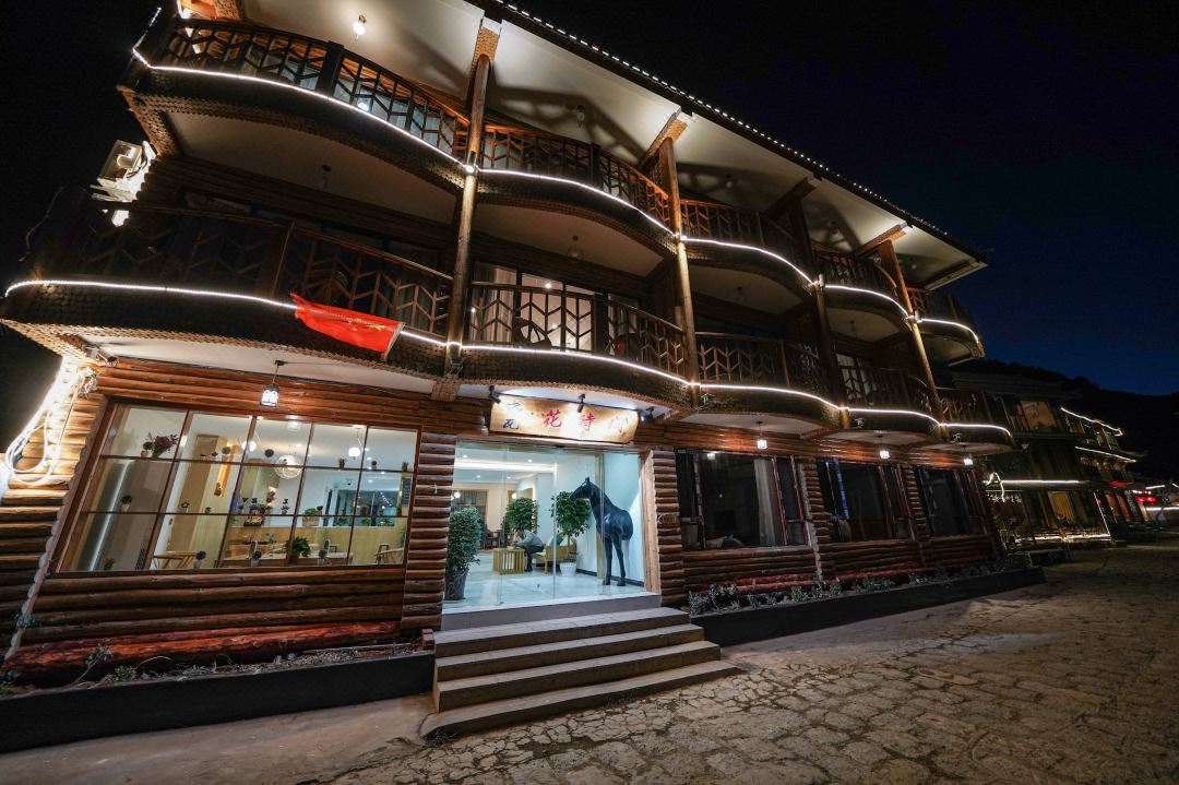 The Hotel exterior of Huashijian Lake View Inn in Lugu Lake, Lijiang